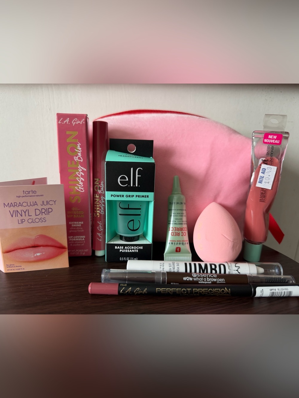 New 10 piece Makeup products (lipstick,primer & eyebrow, Makeup bag & more) - Picture 16 of 16
